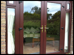 Rosewood uPVC double doors fanlight and opening side panels?